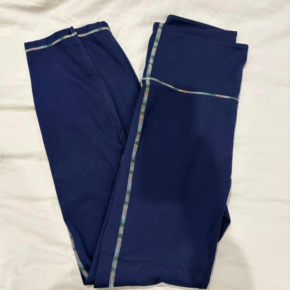 Bundle of 4 leggings - all great quality. Assorted colors, size small.
